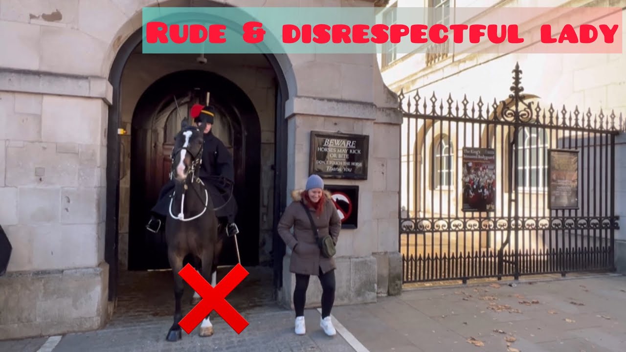 Rude and disrespectful woman poses inside box until she is warned and laughs loudly