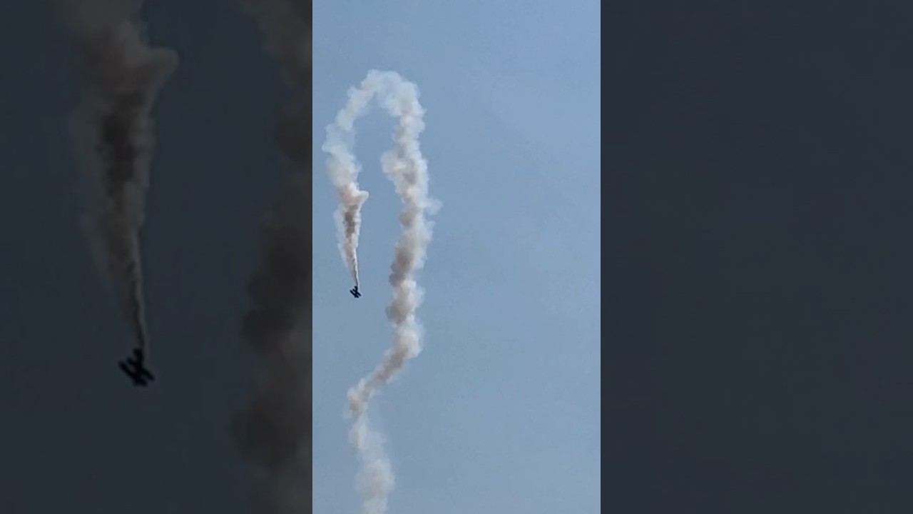 Stunt biplane performs a double hammerhead #airshow2024 #airdisplay #biplane #stuntplane