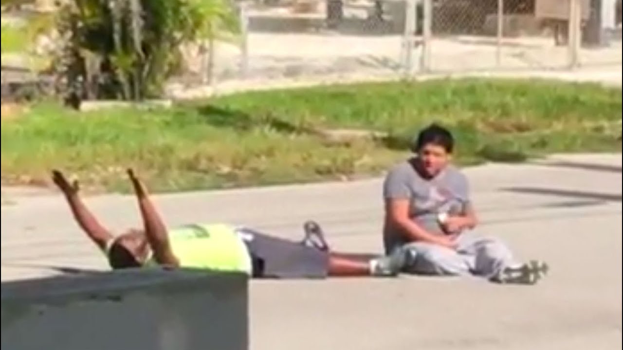 Unarmed Black Man Lying In The Street With Hands Up Gets Shot By Police