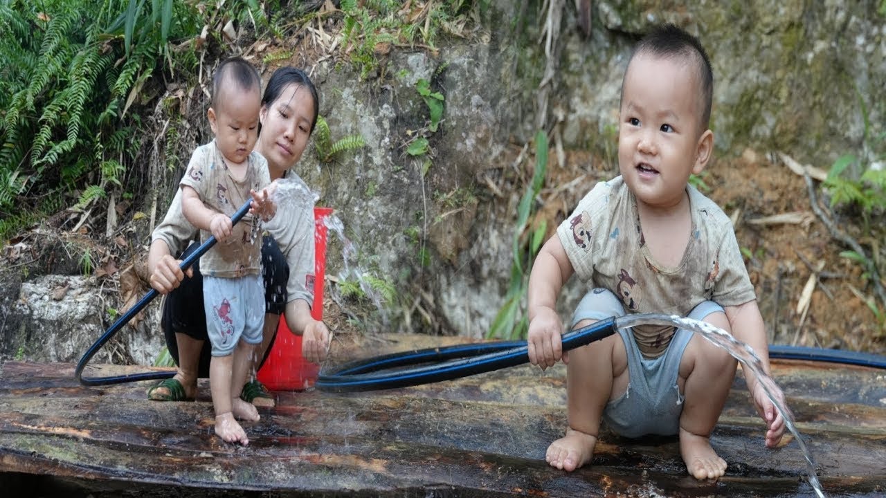 Fetching Water Together: The Bond of Mother and Baby