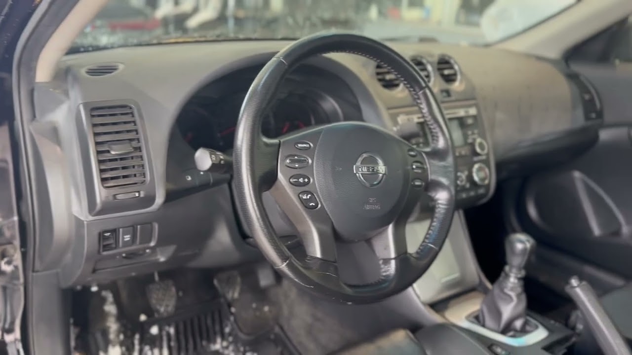 2010 Nissan Altima coupe 3.5 SR six speed 26115a