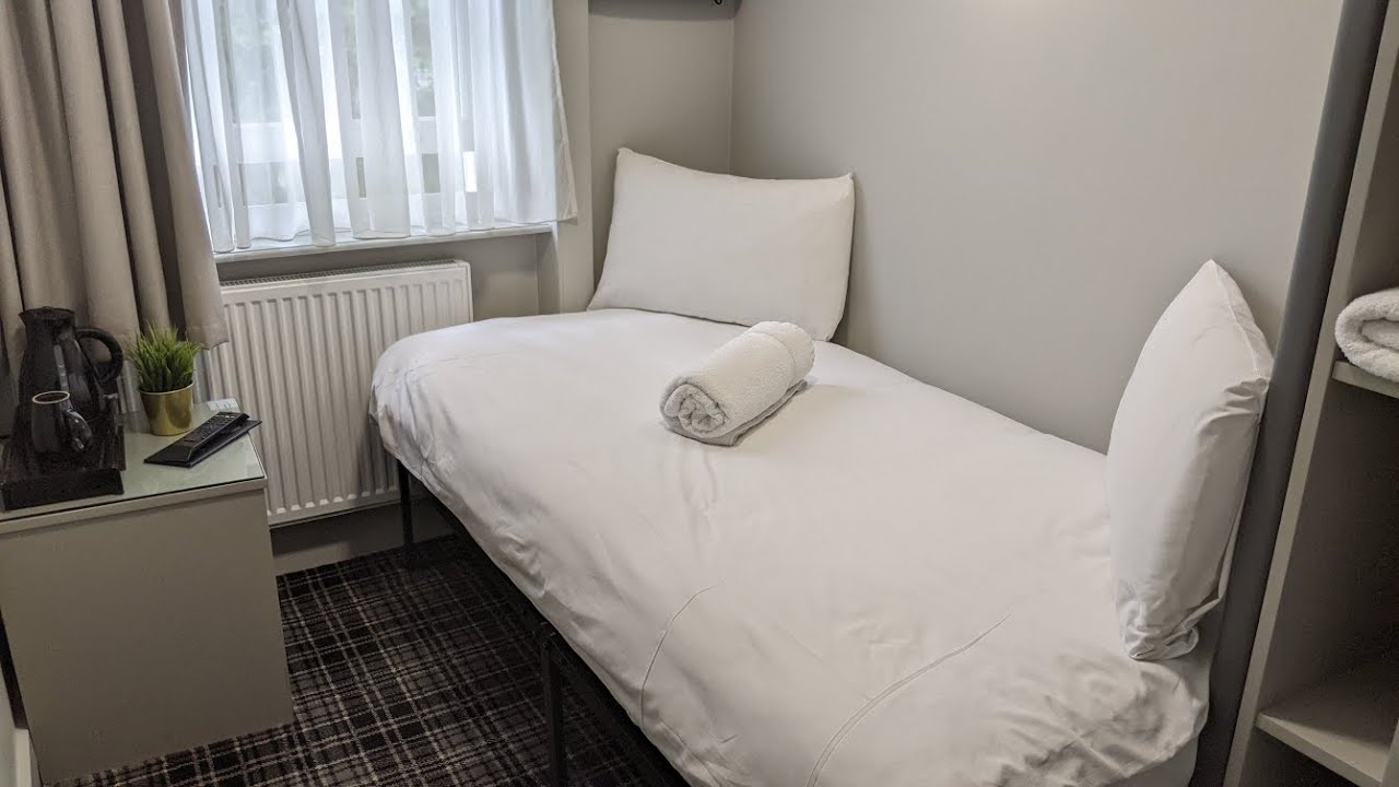 Inside Howard Winchester Hotel London single bed room C303 near King's Cross Saint Pancras