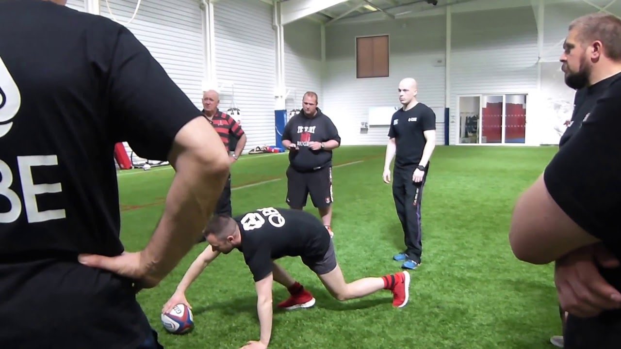 Drill practising getting hips up first in rugby