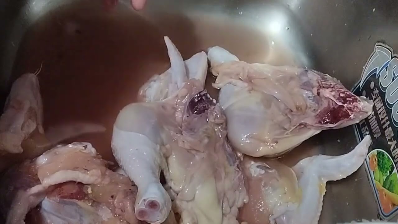 cleaning  the fresh chicken!!