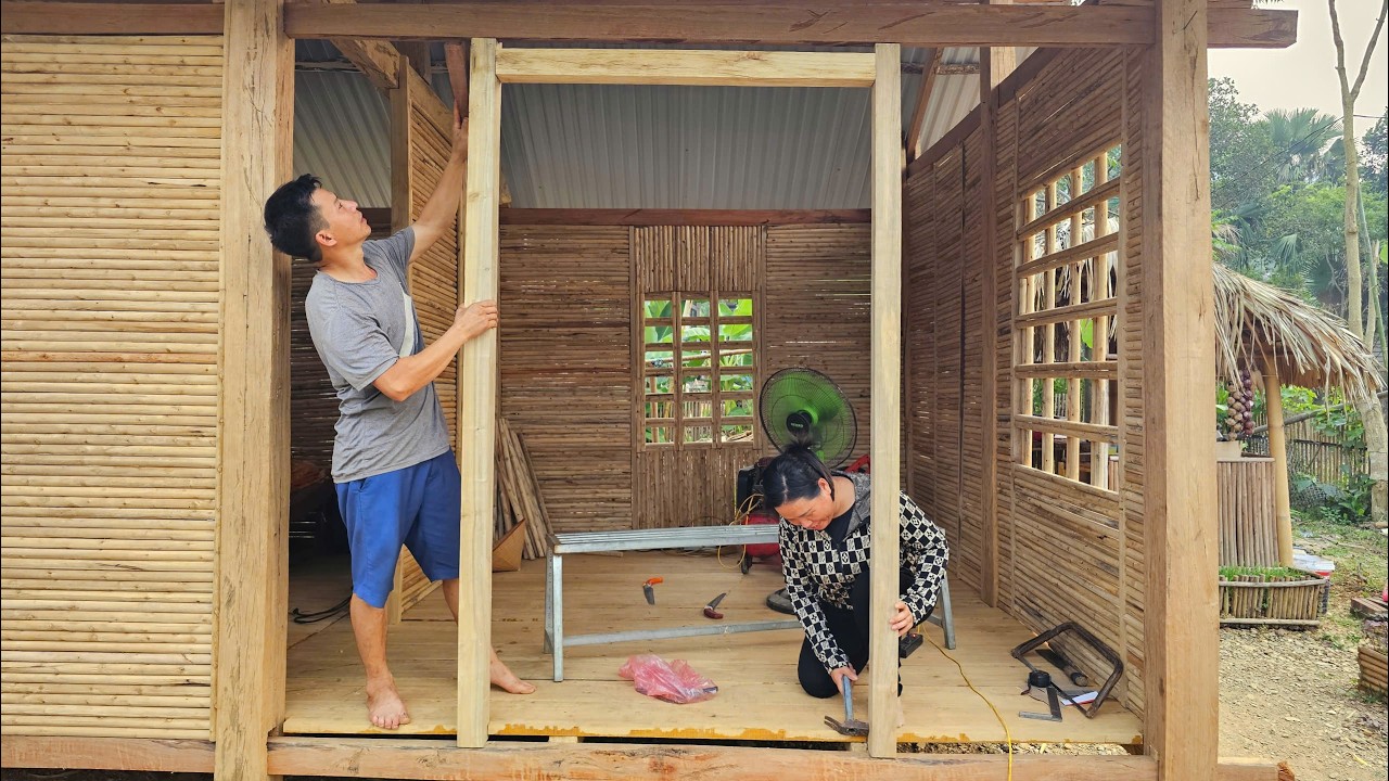 Mr. DAU wholeheartedly helped DAN complete the wooden front door frame. Journey to a new roof