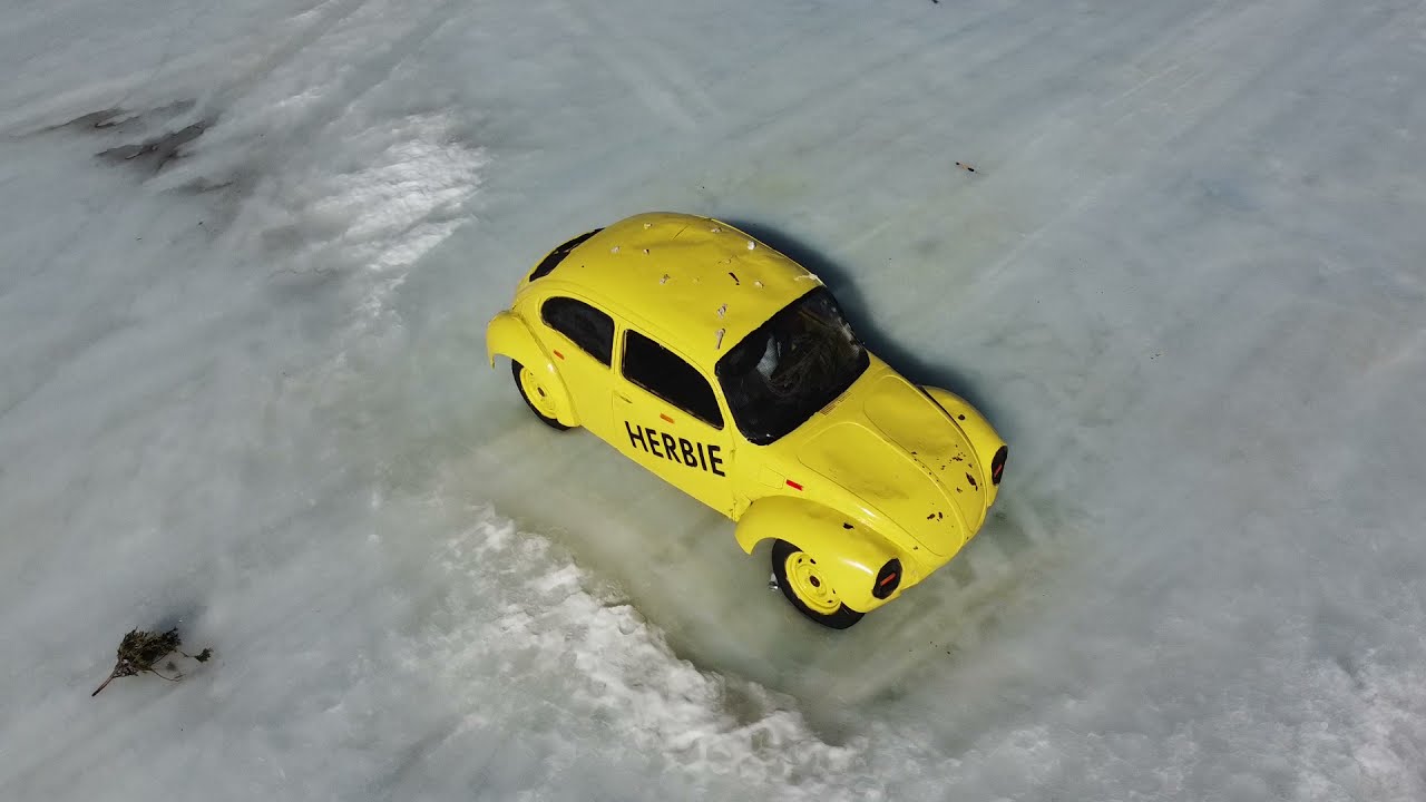 Herbie, the yellow buggie car on ice in Kenogami, Northern Ontario