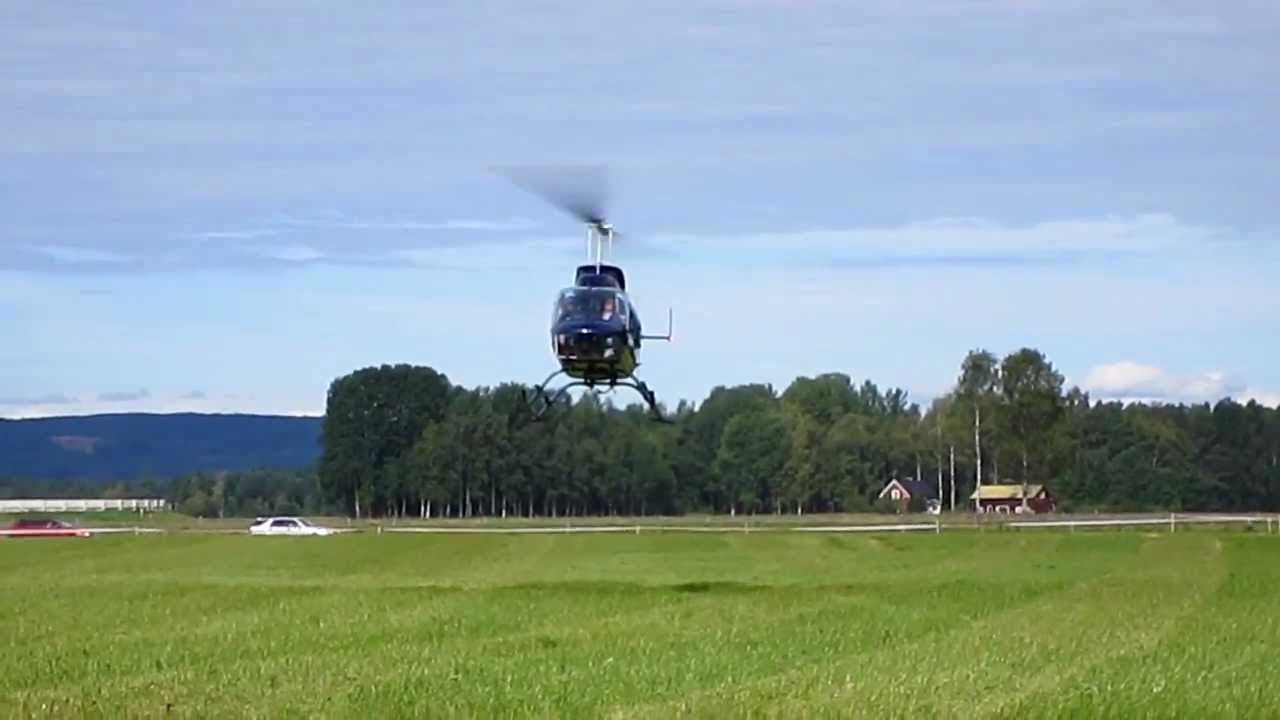 Augusta Bell 206 Jet Ranger, landing.