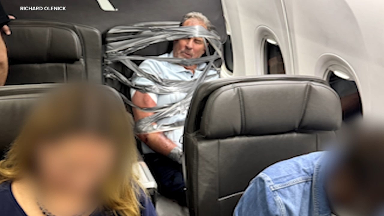 Unruly passenger arrested after being restrained with duct tape during flight