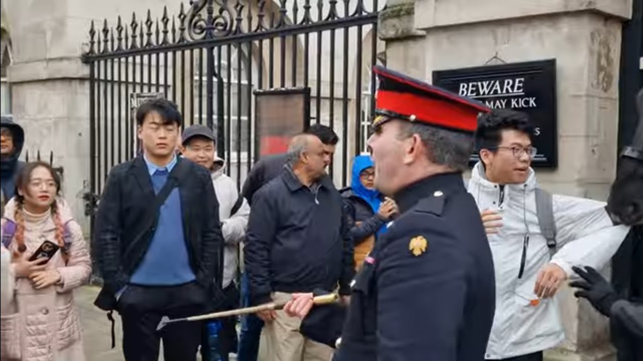 Corporal confronts Chinese tourists. Don't touch my horse again it's not funny.