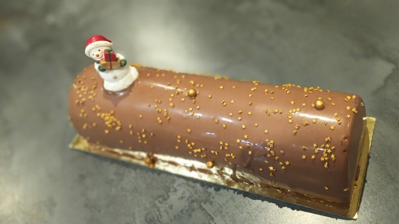 Bûche 3 chocolat sur croustillant praliné