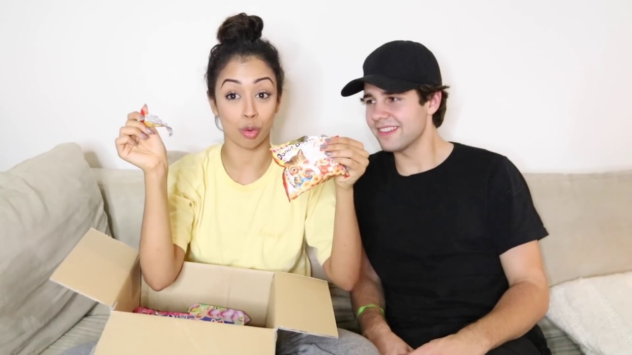 Couple trying japanese candy