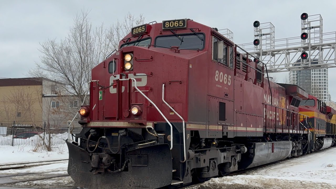 CPKC 137 passing through osler st 
