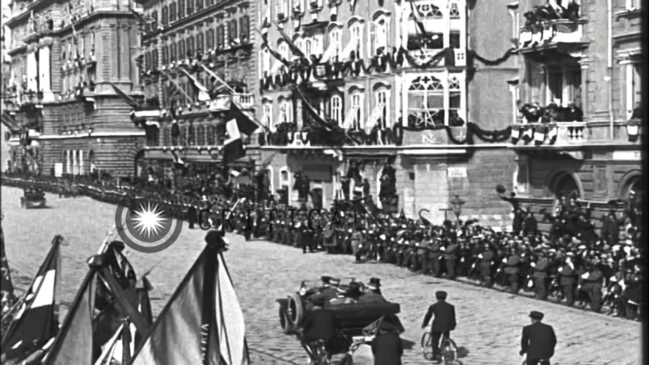 Victor Emmanuel III in a car driven past the crowd gathered and waves to the peop...HD Stock Footage