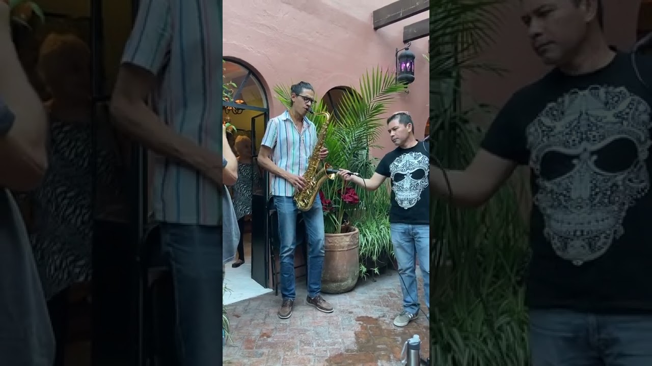 Saxophonist Alberto Robledo playing with the Adrian Flores family band