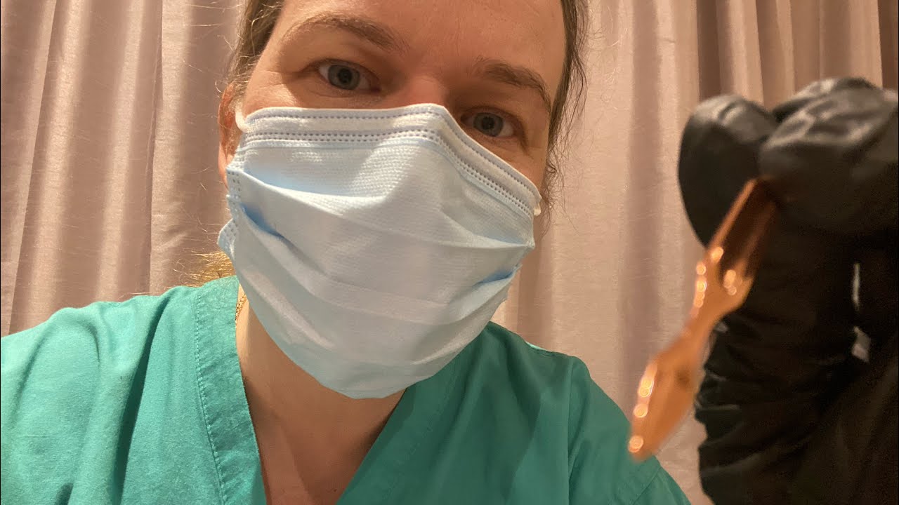 ASMR - A dentist cleans your teeth (real camera touching)