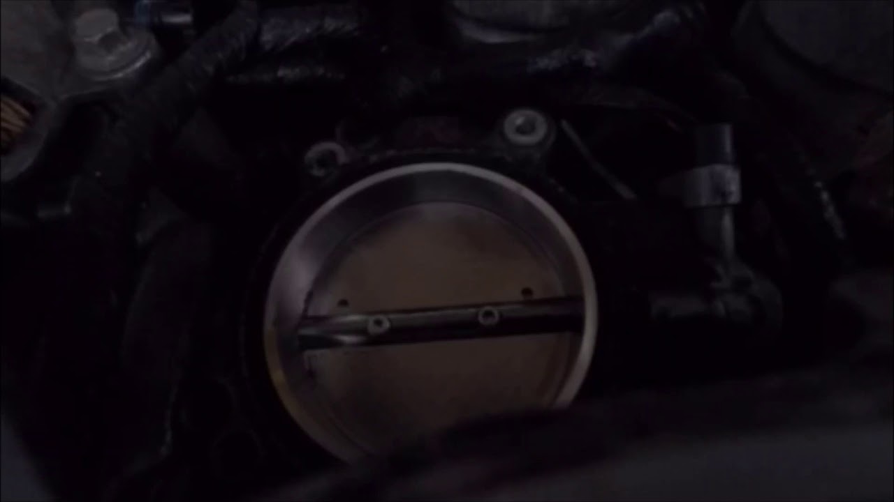 Throttle plate removal on a 2004 F250 6.0 power stroke.