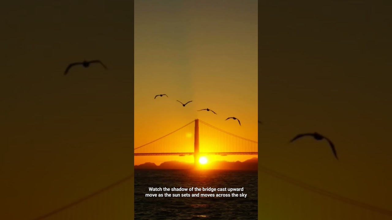 Amazing timelapse of the sunset casting the Golden Gate Bridge shadow upward!