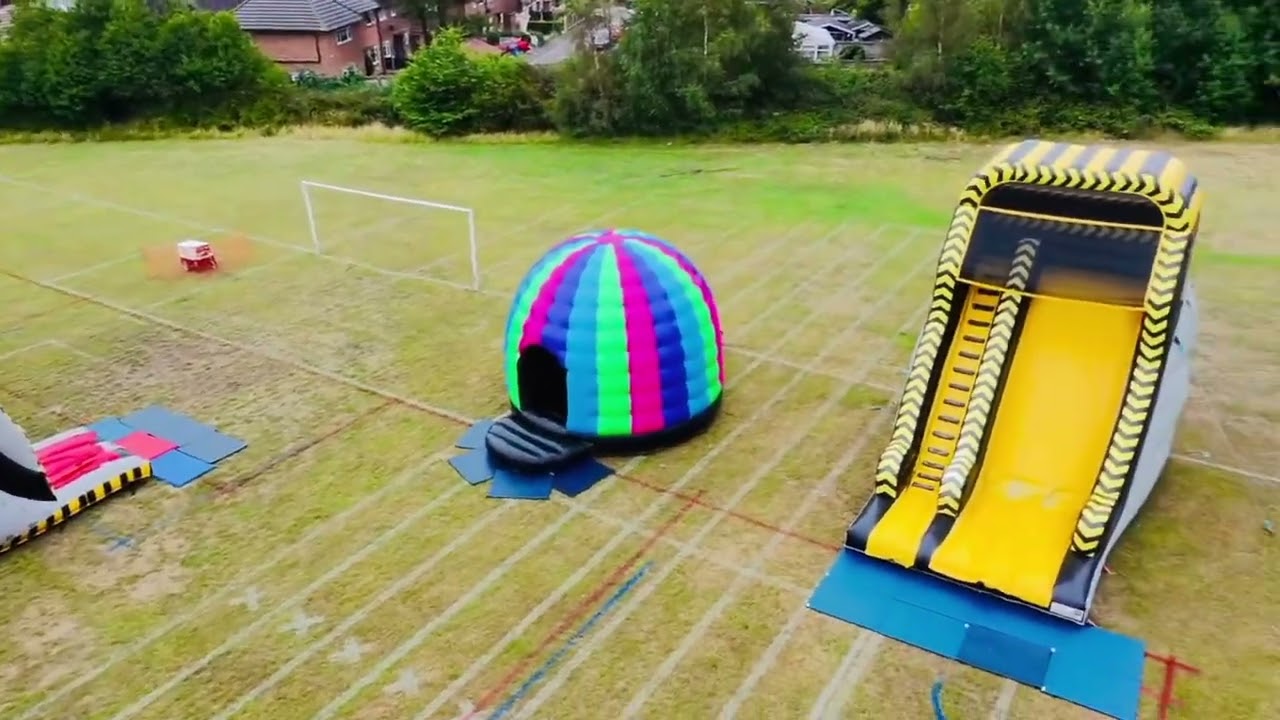 🚀 Drone Footage of School Funday Inflatable Event Setup 🚀