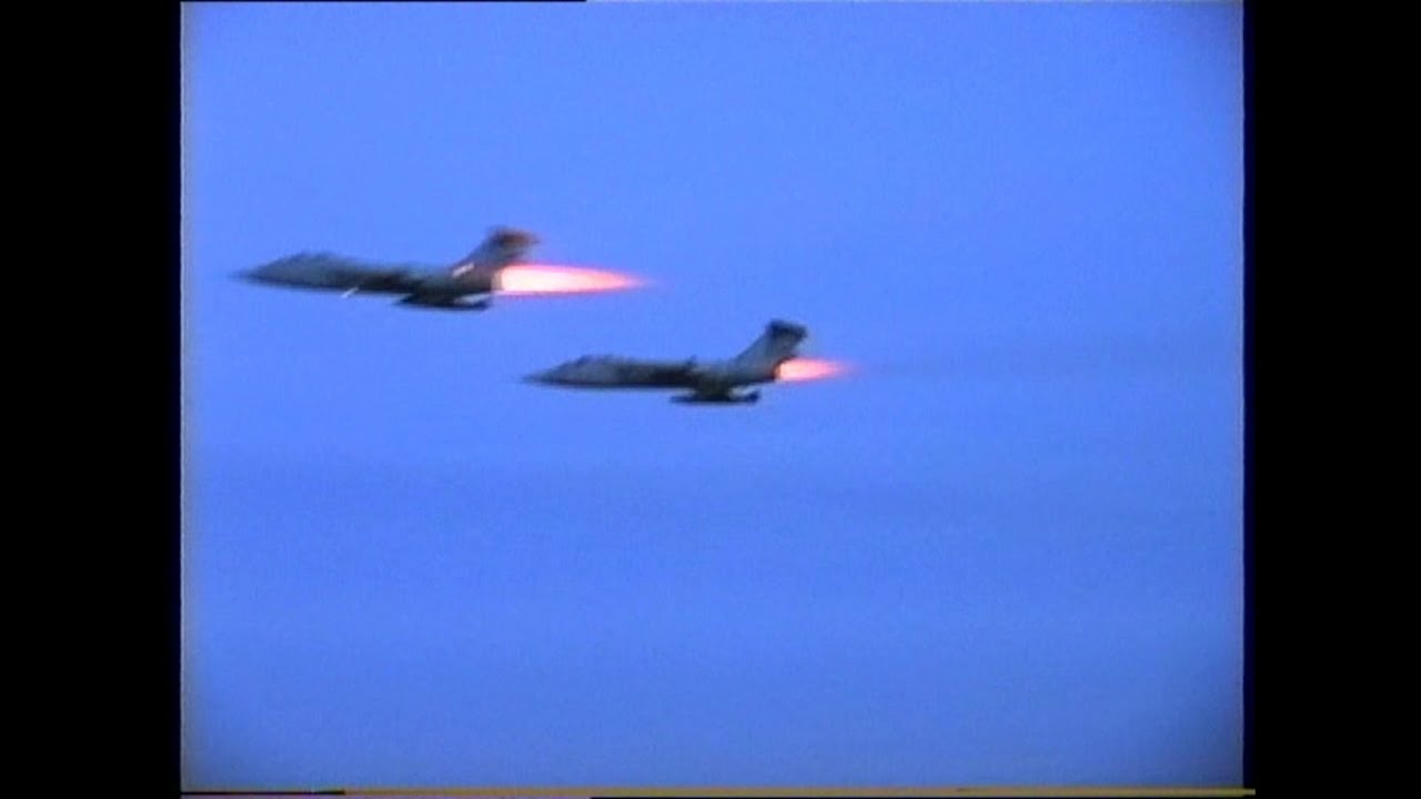 Italian Air Force TF104's 4-47 and 4 48 at Grosseto 15 Sept 2003.Dramatic pairs burner low approach.