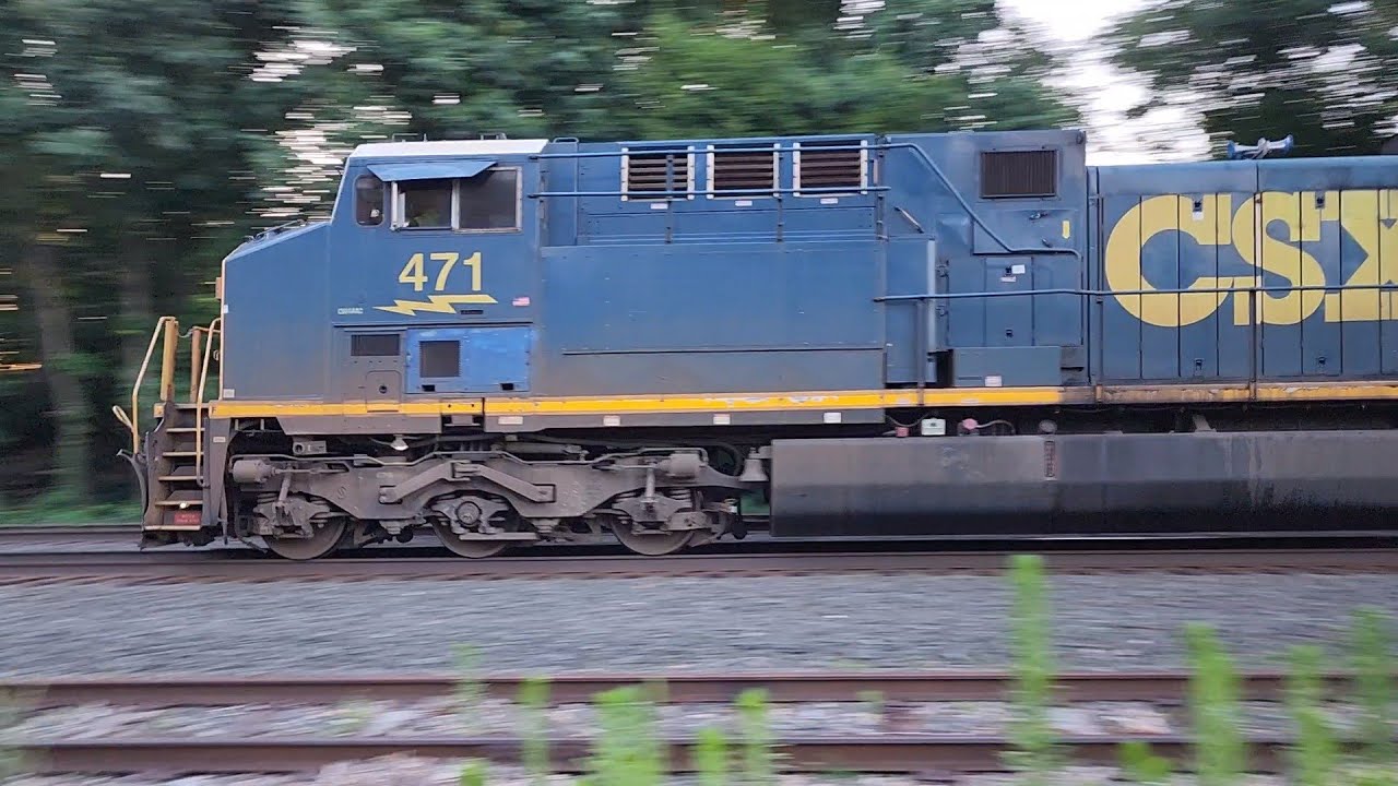 CSX M427-09 gives a shave and a haircut at CP 64.