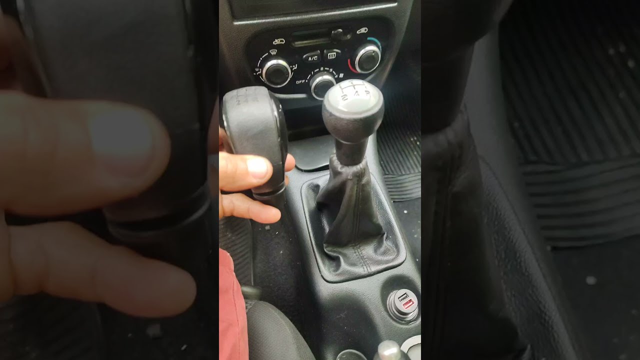 Troca da manopla do c&acirc;mbio de marcha do Peugeot 207