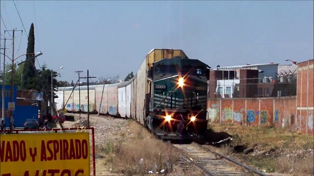 AWESOME!!! FERROSUR 4426 AC4400 EN CALZADA ZARAGOZA CON TREN AUTOMOTRIZ LARGO