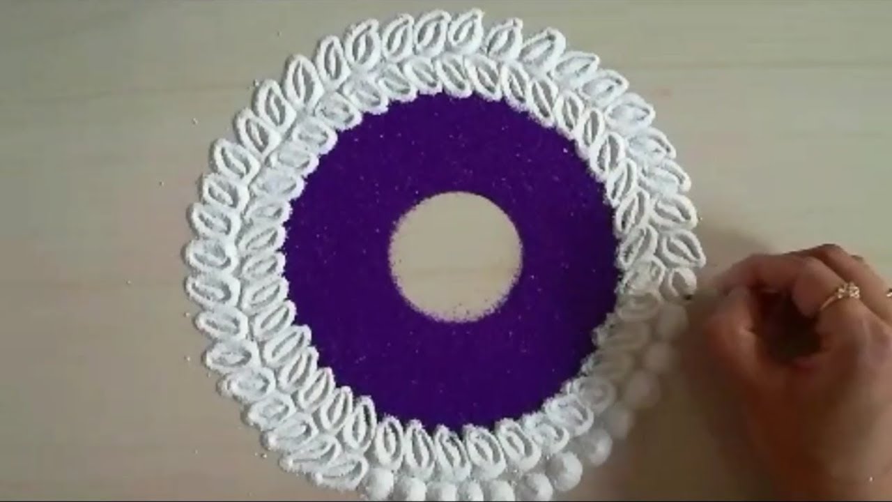 How to make creative and colourful rangoli design | easy rangoli by Yogita Garud