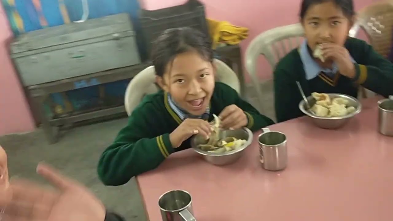 lower tcv school, students enjoying lunch momo..