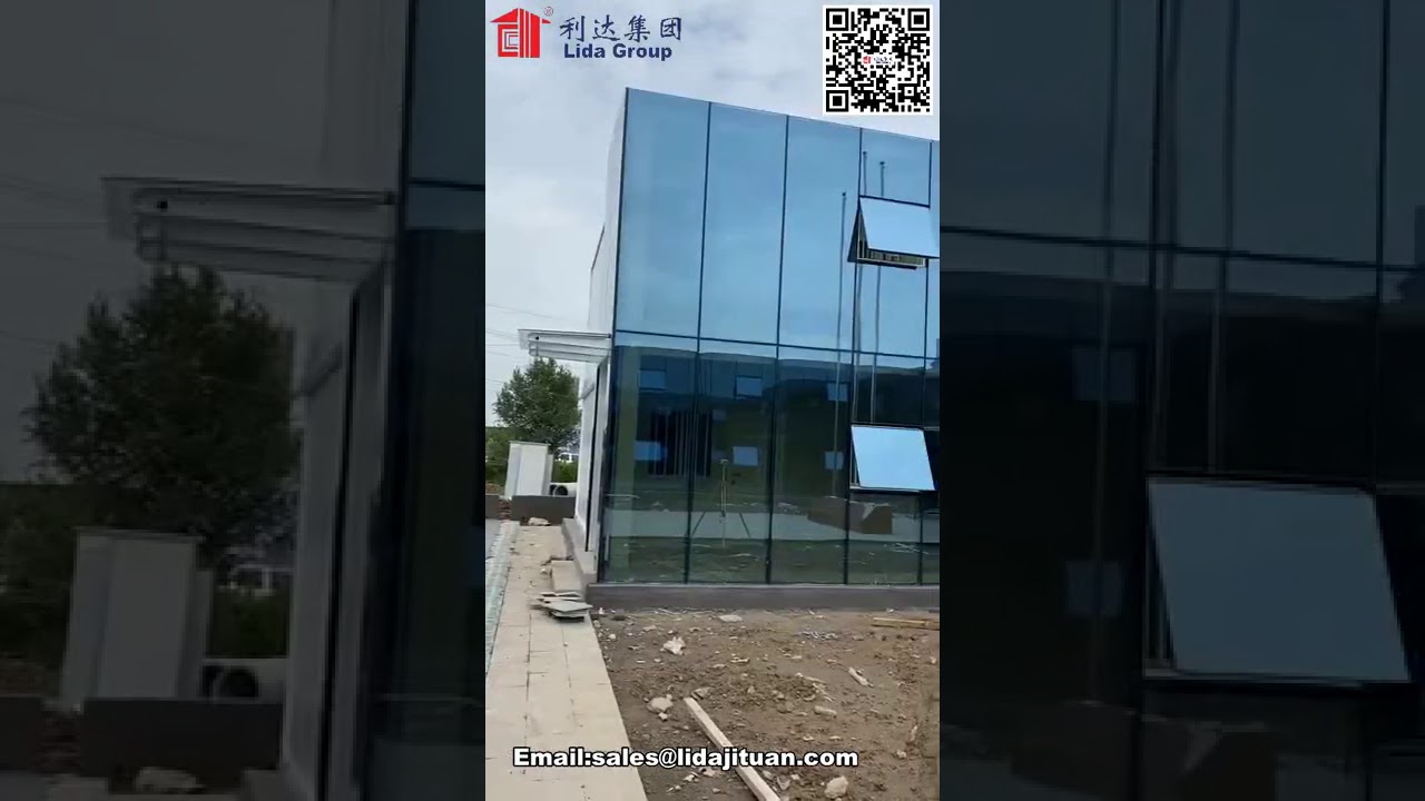 Container hotel buildings with glass curtain wall