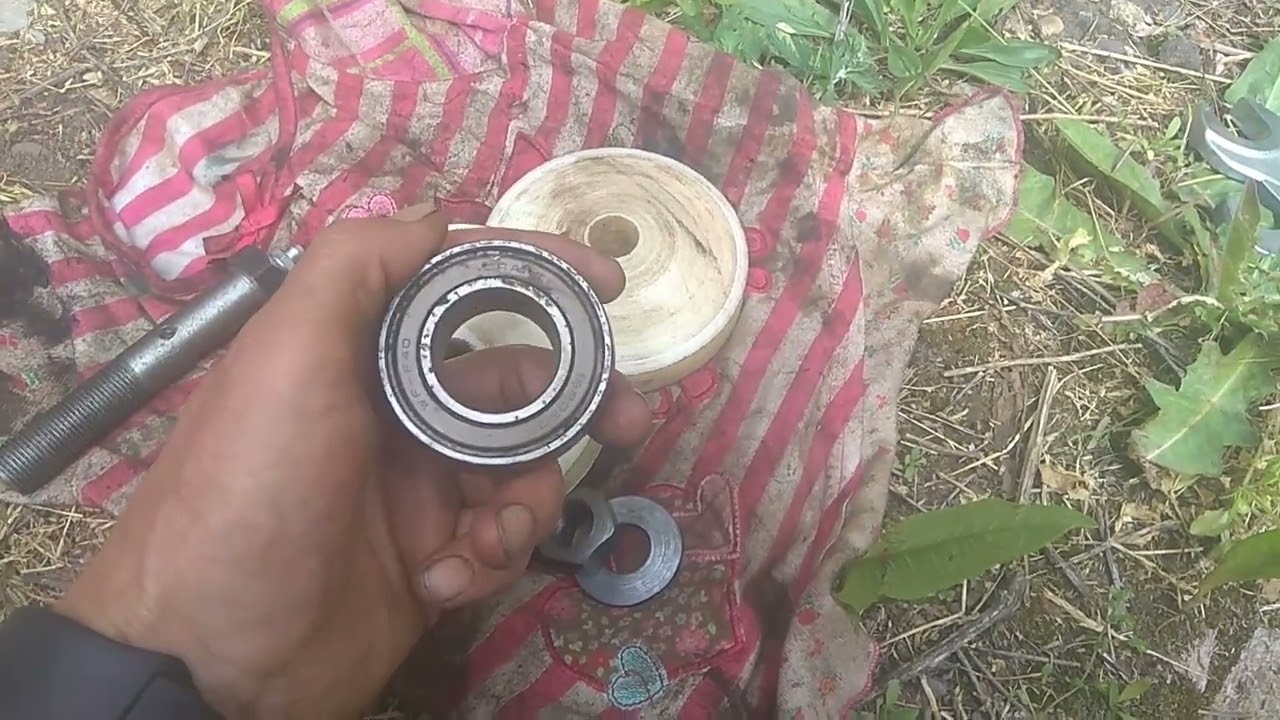 Приспособление для смазки закрытых подшипников.