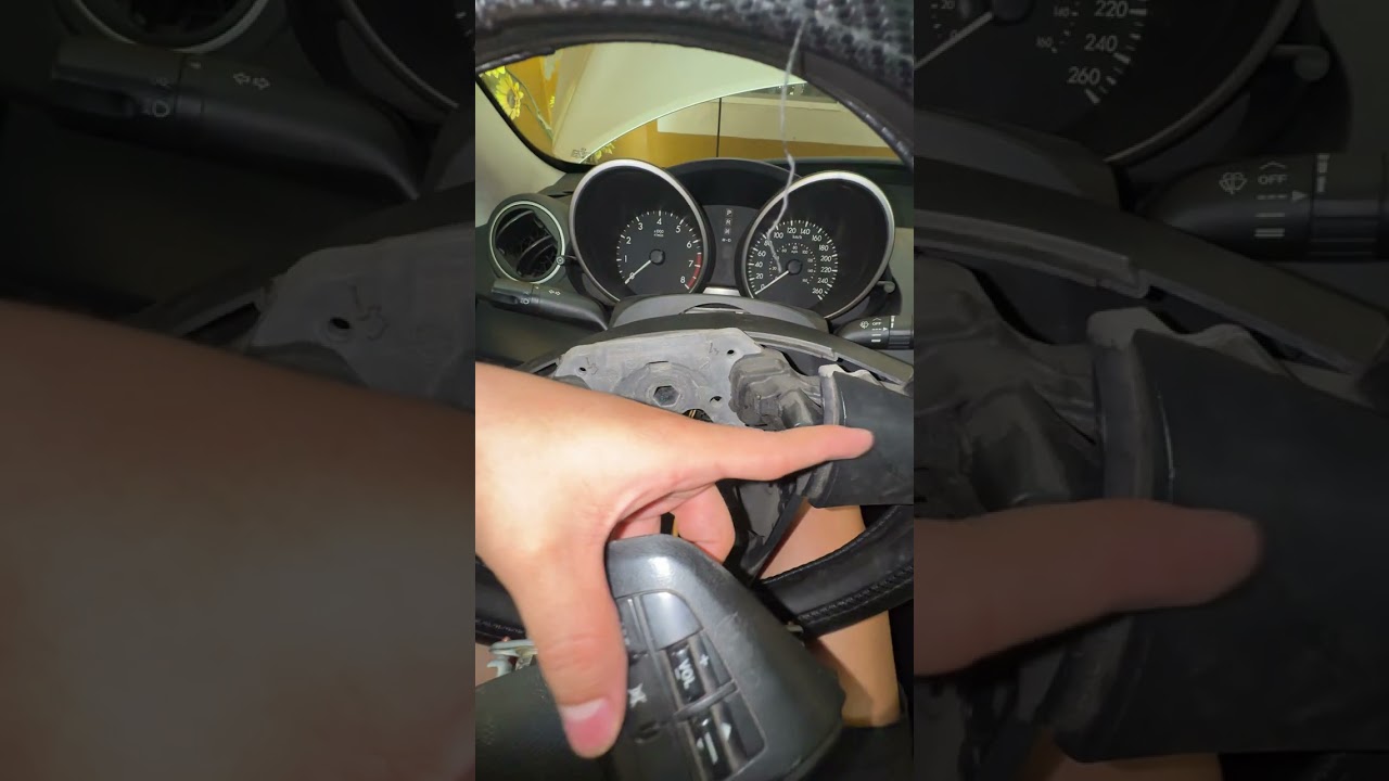 Cambio botones volante Mazda 3