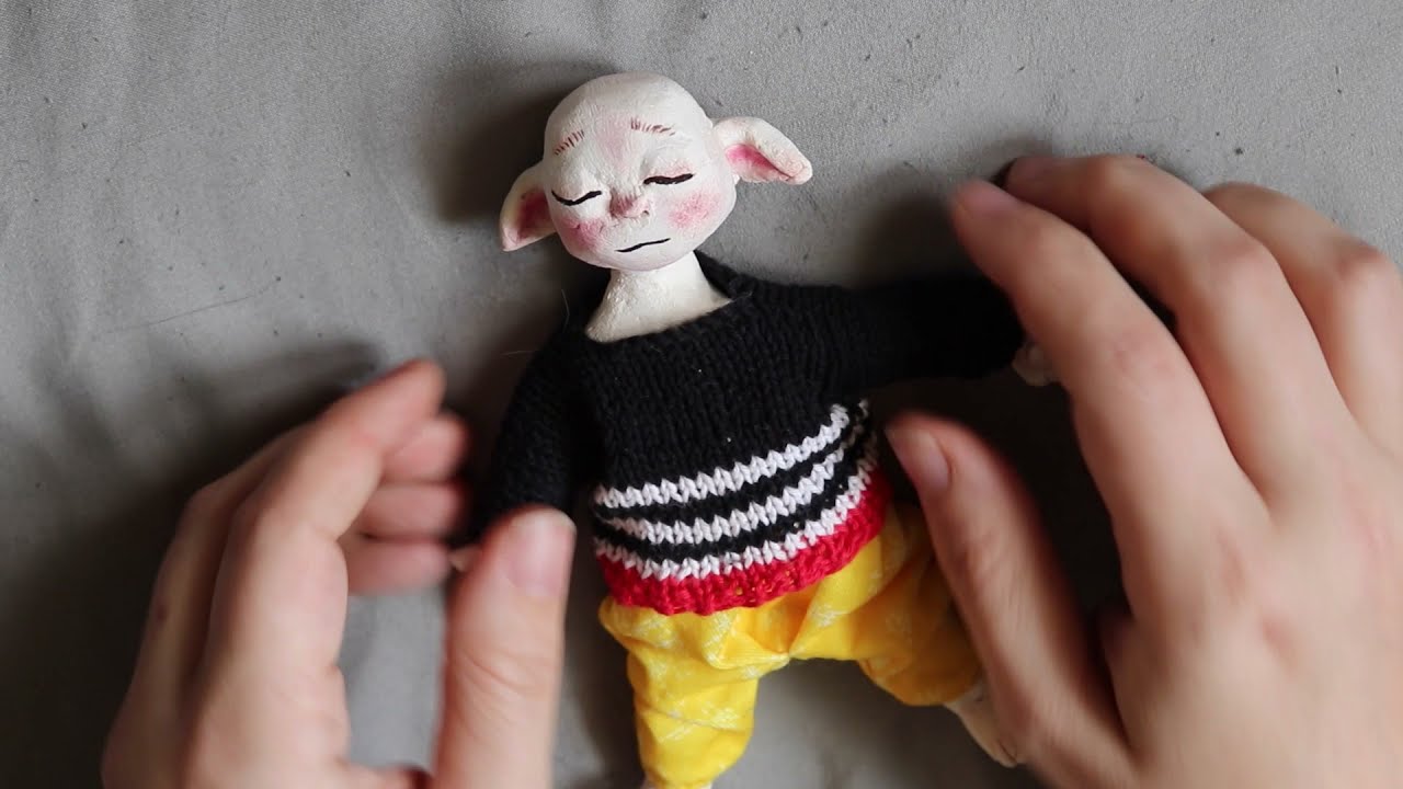 Making Kevins: An army of Polymer Clay cloth bodied art dolls.