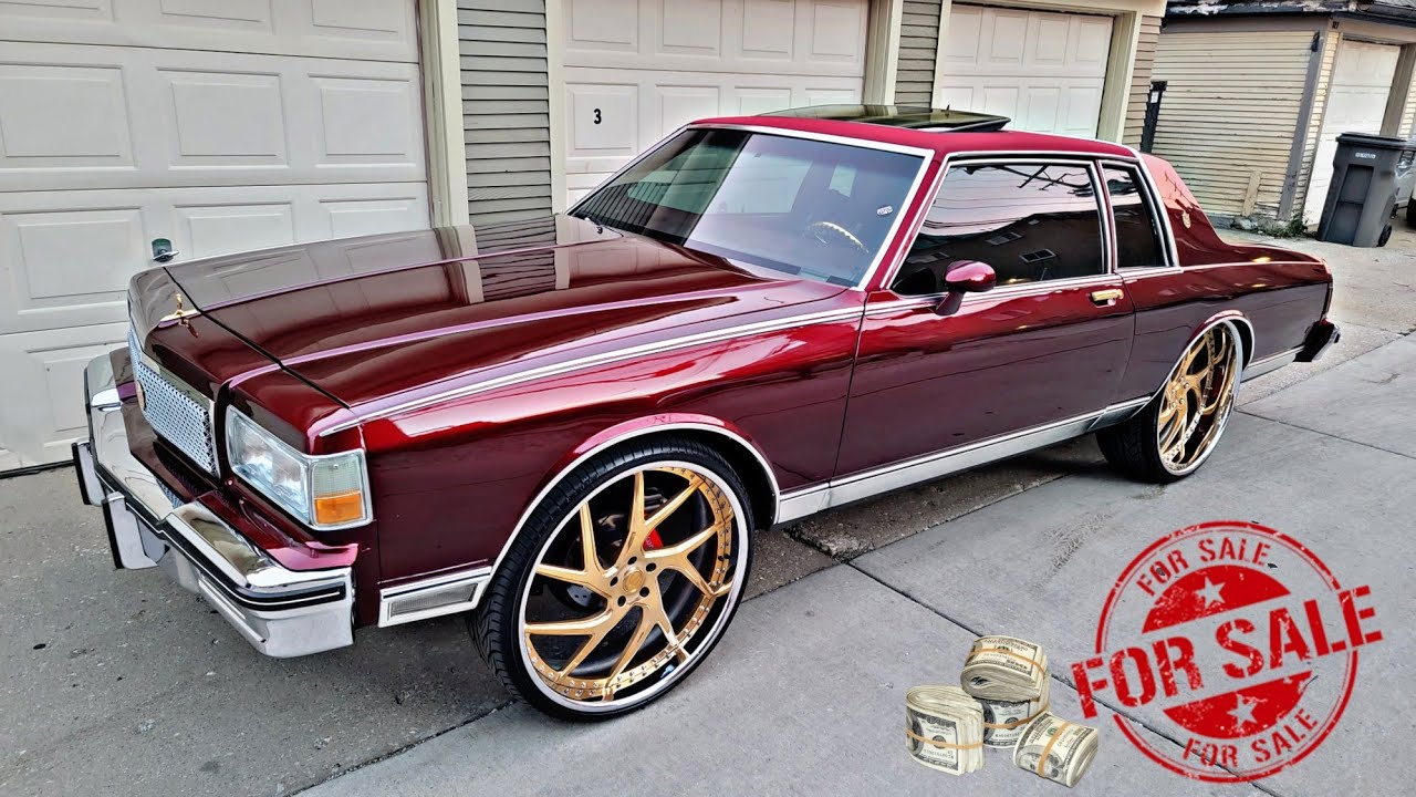 Caprice Landau candy painted on 26s gold plated savini wheels