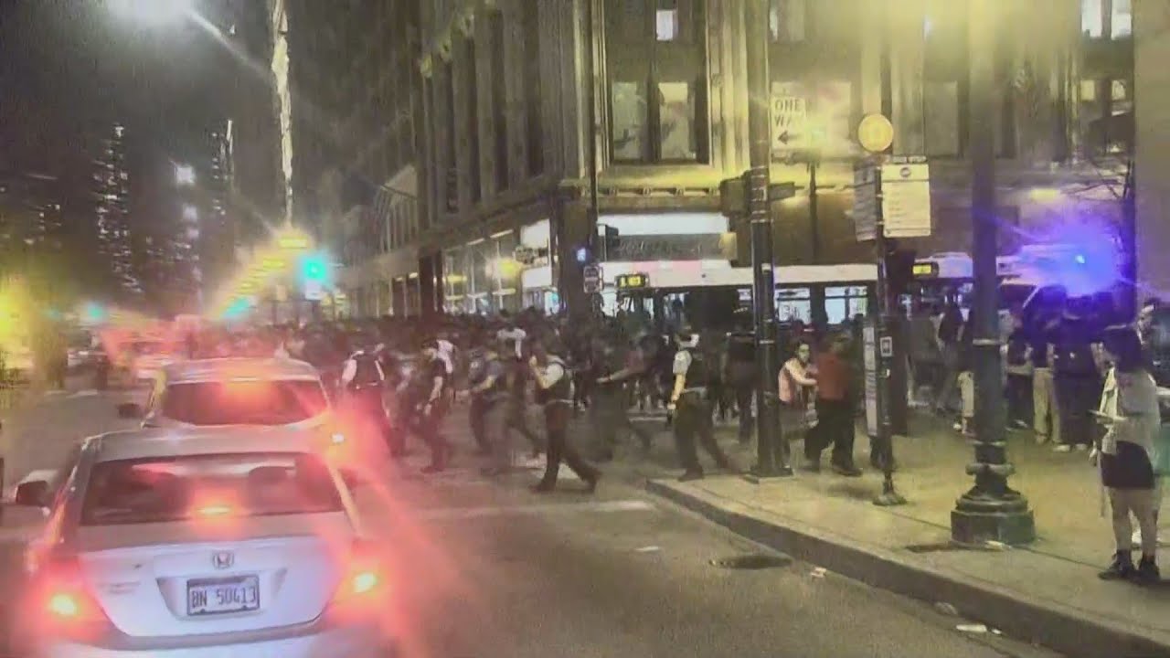 Couple robbed, threatened during Loop violence