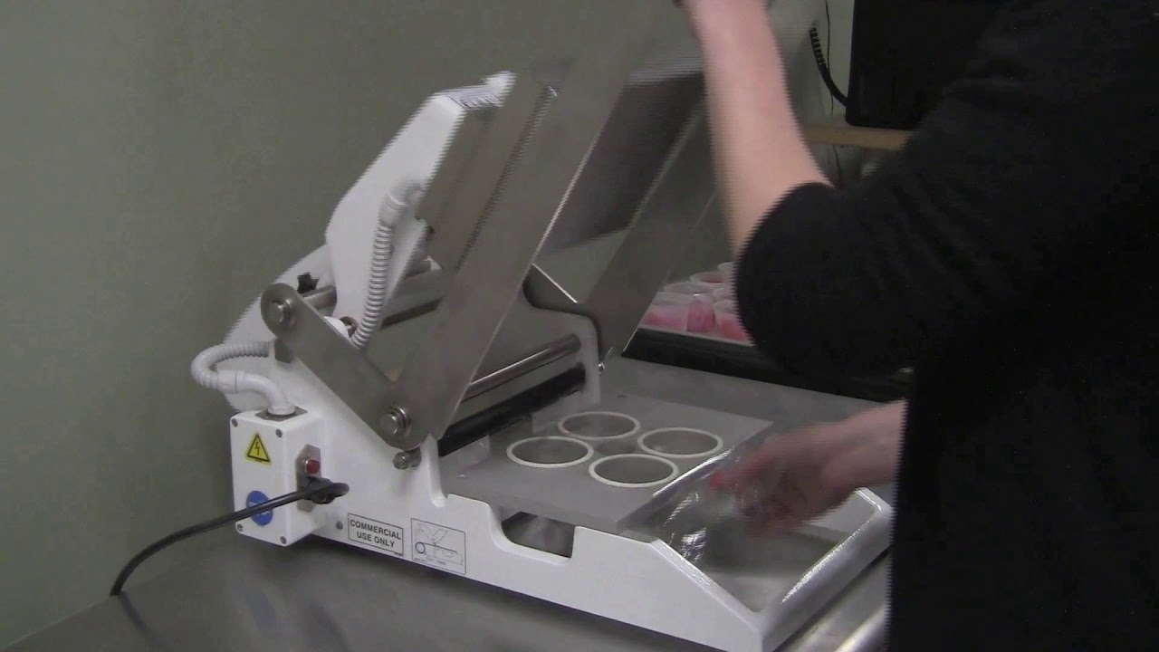 Portion Cup Sealing System