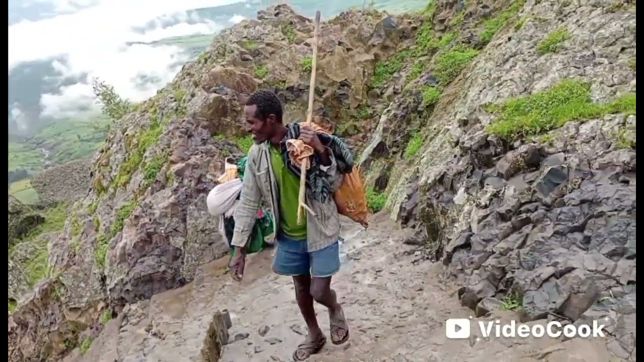 በሰሜን ሸዋ እንሳሮ ወረዳ ለሚን ከጎሽ ውሃ የሚያገናኝ ውሻ ገደል መንገድ