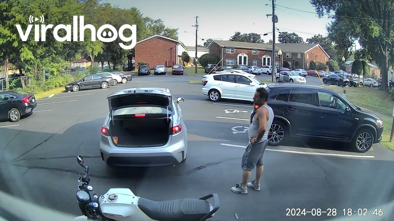 Would-Be Thief Tries to Fit Motorcycle in Trunk || ViralHog