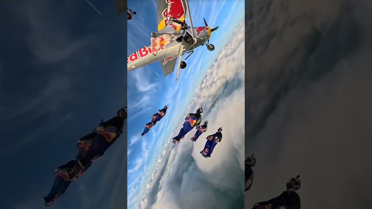 Formasi Epik di Langit: Wingsuit Mengapit Pesawat di Antara Awan