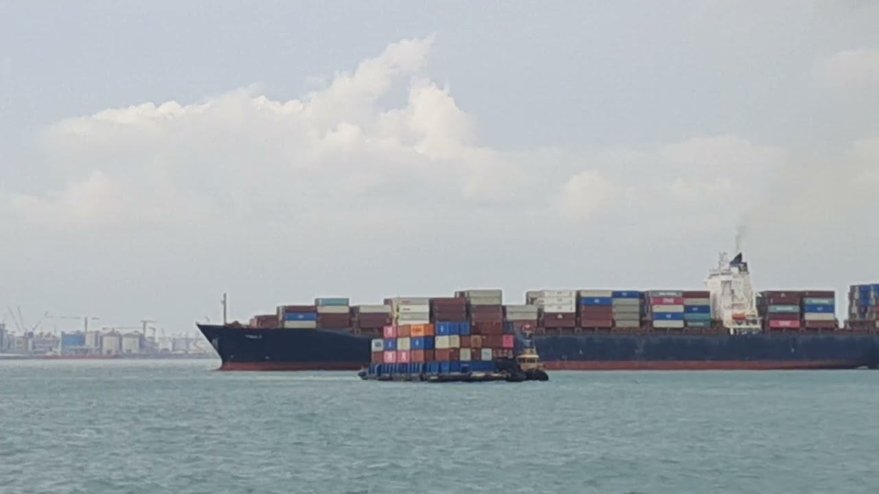 CONTAINER VESSEL AND CONTAINER  passing at sea