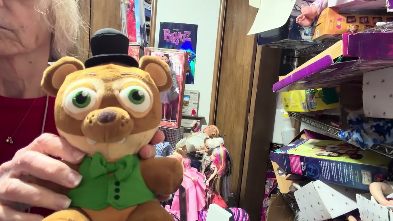 Five Nights at Freddy’s plushies and card.