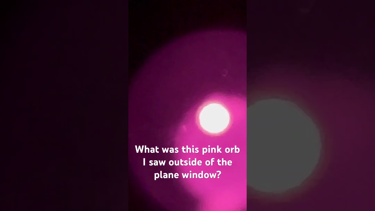 Pink orb on flight from Vietnam to Seattle. Captured while I was over Taipei. #orb #pinkorb #plane
