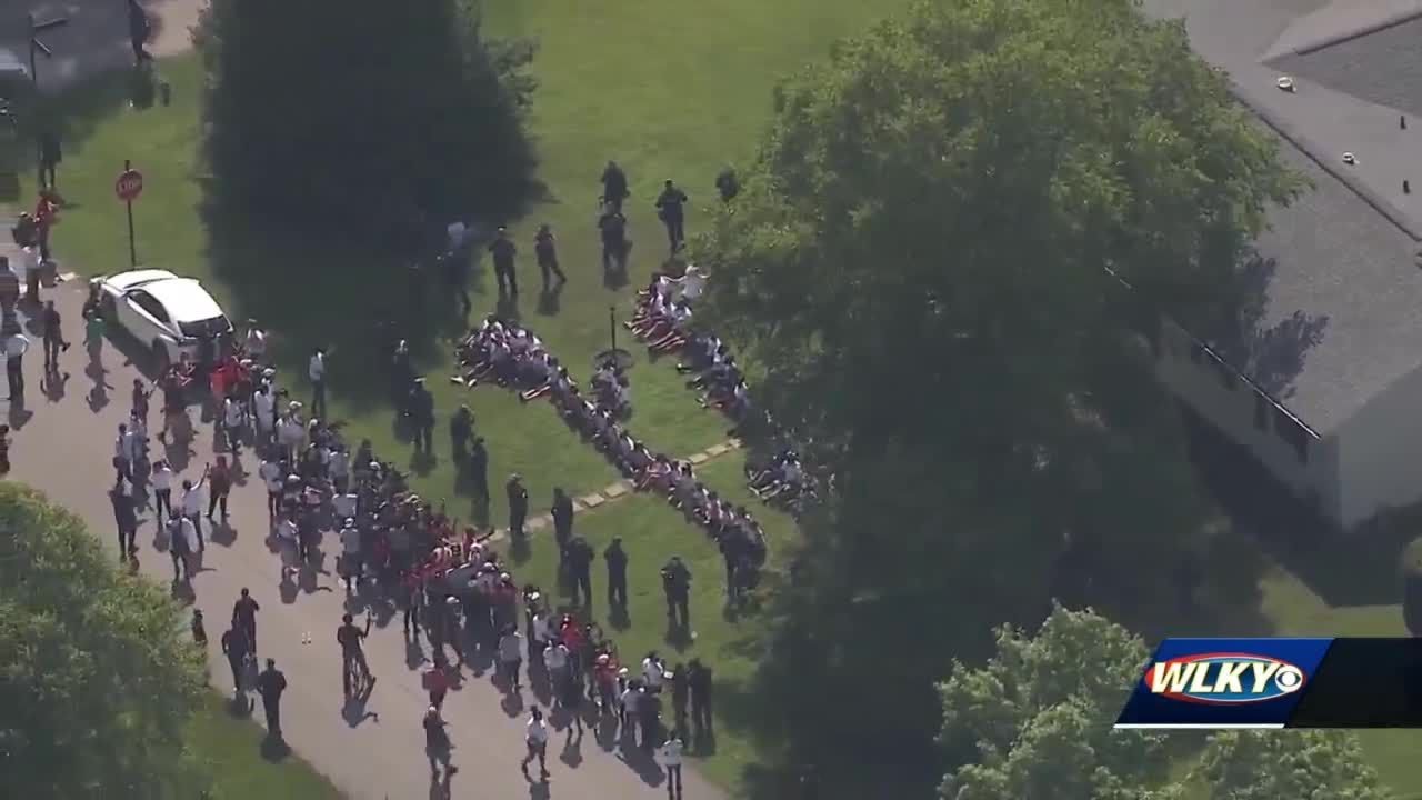 Senior citizens protest on attorney general's lawn, at least 1 arrested
