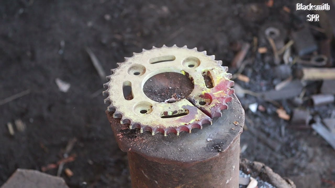 FORGED IN FIRE TO MAKE A NICE KNIFE FROM SPROCKET.