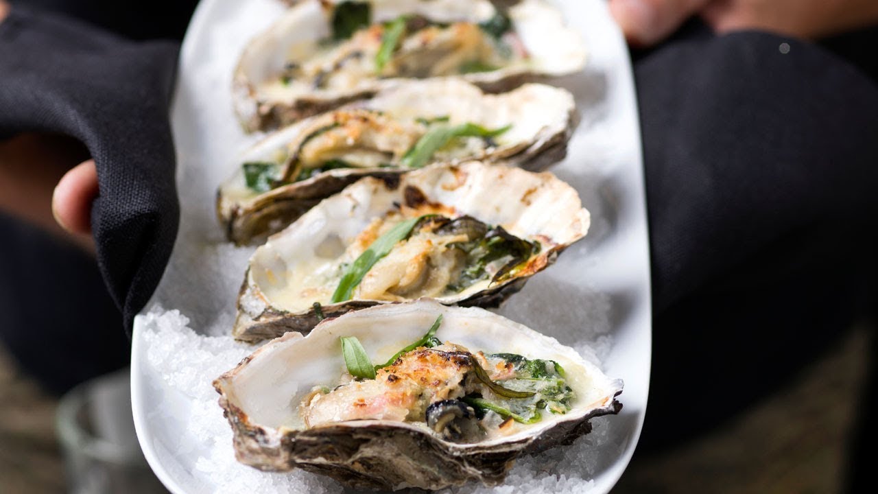 Gegratineerde oesters met spinazie en champagnesaus