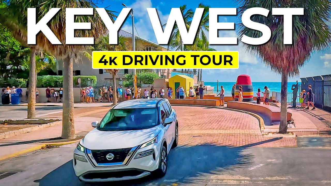 Cruise Key West's charm: turquoise waters, vibrant streets, and tropical vibes! 🌴🚗