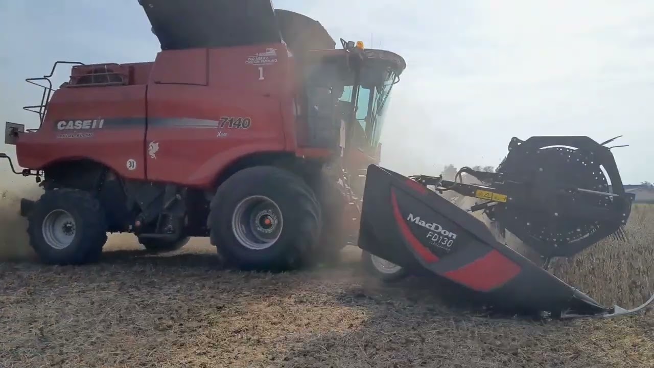 Harvest in Austria 2022 w/ Case IH 7140 Axial Flow pushing a MacDon FD 130 and a Geringhoff HS II