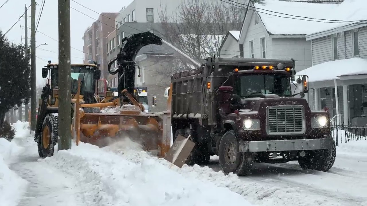 Snow removal operation on Carruthers avenue in Ottawa