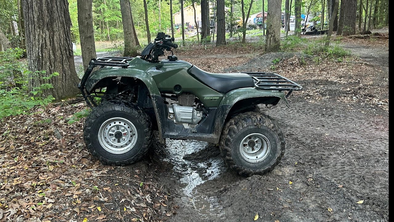 riding trails on a Honda recon 250