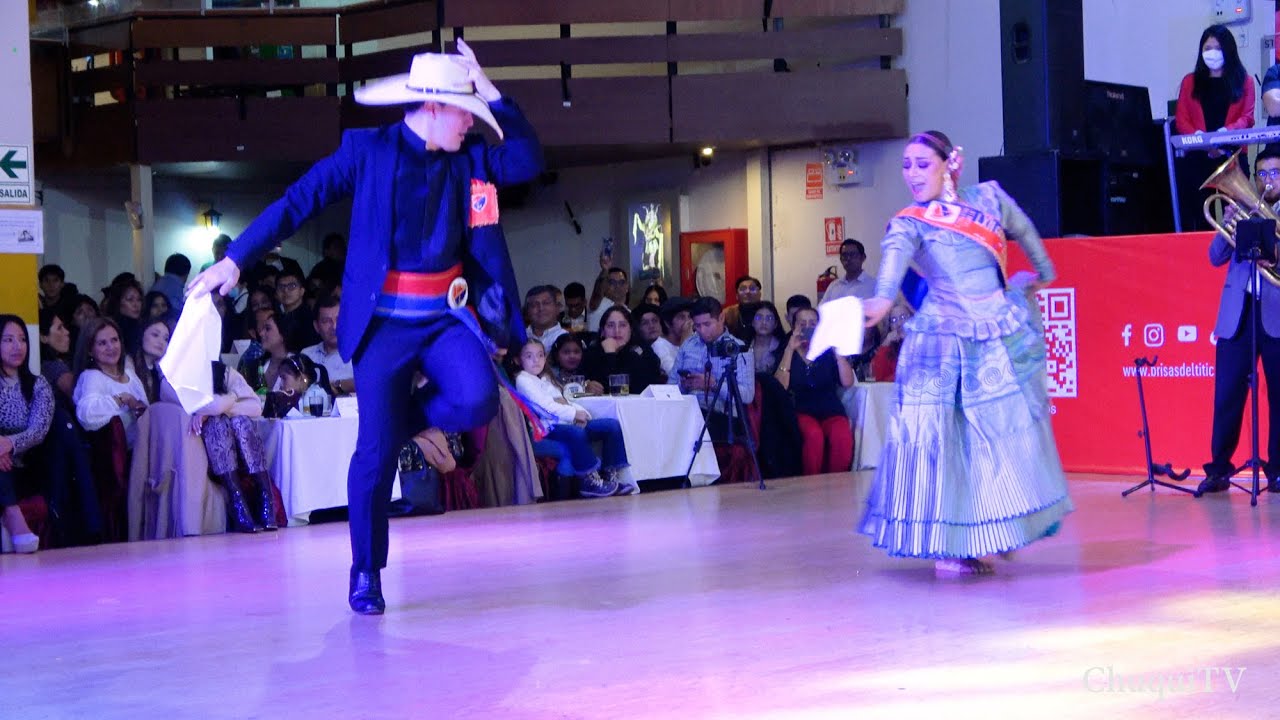 Dayanna Ñahuis y Mauricio Wong. Campeones Mundiales Adulto. Almuerzo Interacademias 2022