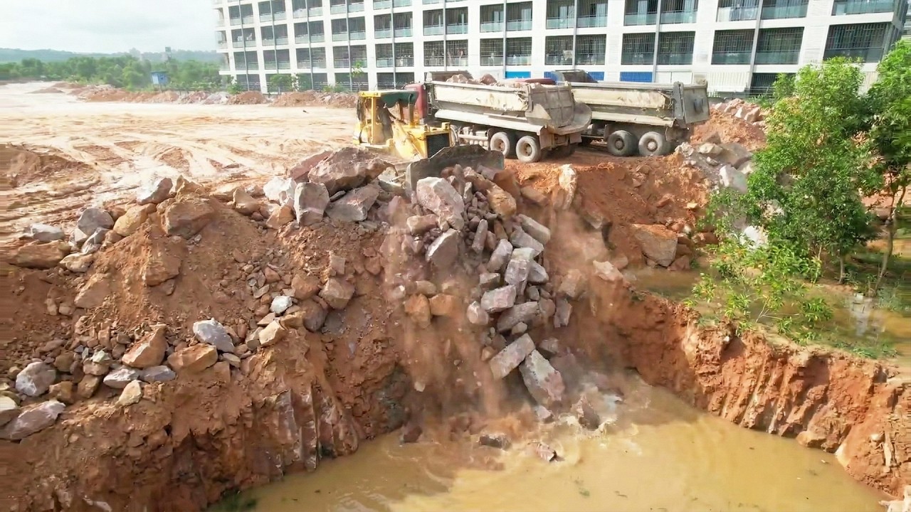 Fantastic Heavy Equipment Work Teams Transport & Moving Large Stones Filling in Lowland Area